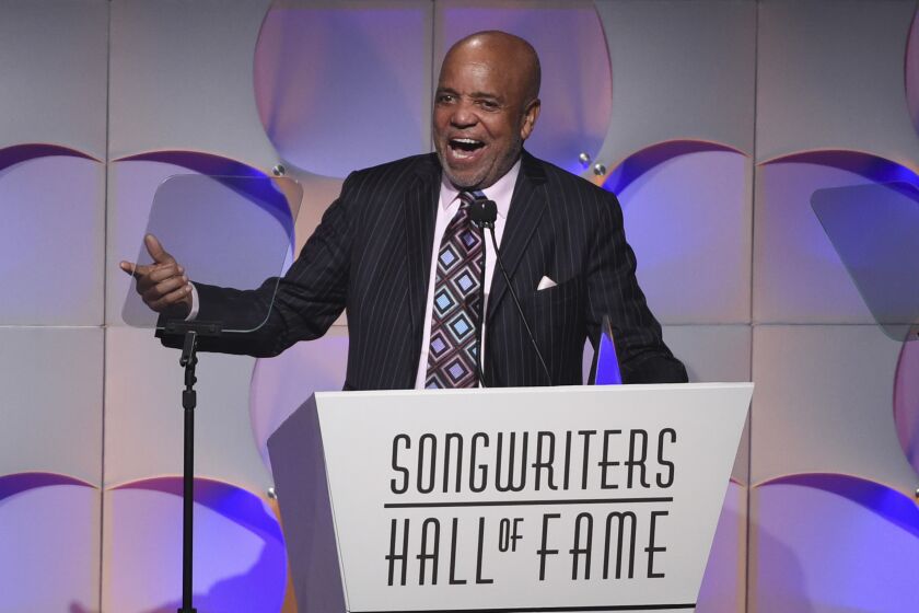 FILE - In this June 15, 2017, file photo, music mogul Berry Gordy accepts his award at the 48th Annual Songwriters Hall of Fame Induction and Awards Gala at the New York Marriott Marquis Hotel, in New York. The Motown mogul who launched the careers of numerous stars like Stevie Wonder, Diana Ross and Michael Jackson has announced his retirement. The Detroit Free Press reports Gordy said he had "come full circle" at a 60th anniversary event for Motown Records on Sunday, Sept. 22, 2019. (Photo by Evan Agostini/Invision/AP, File)