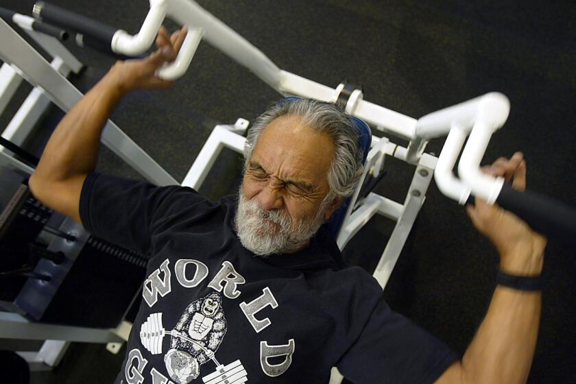 Comedian Tommy Chong works out at the World Gym in Marina del Rey on February 2, 2005.