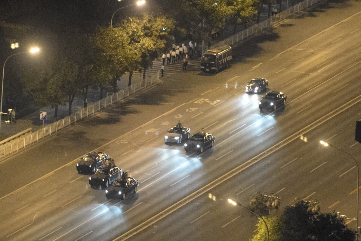 Chinese military vehicles drive on a closed road during a rehearsal for a parade in Beijing marking the 70th anniversary of the end of World War II in Asia.