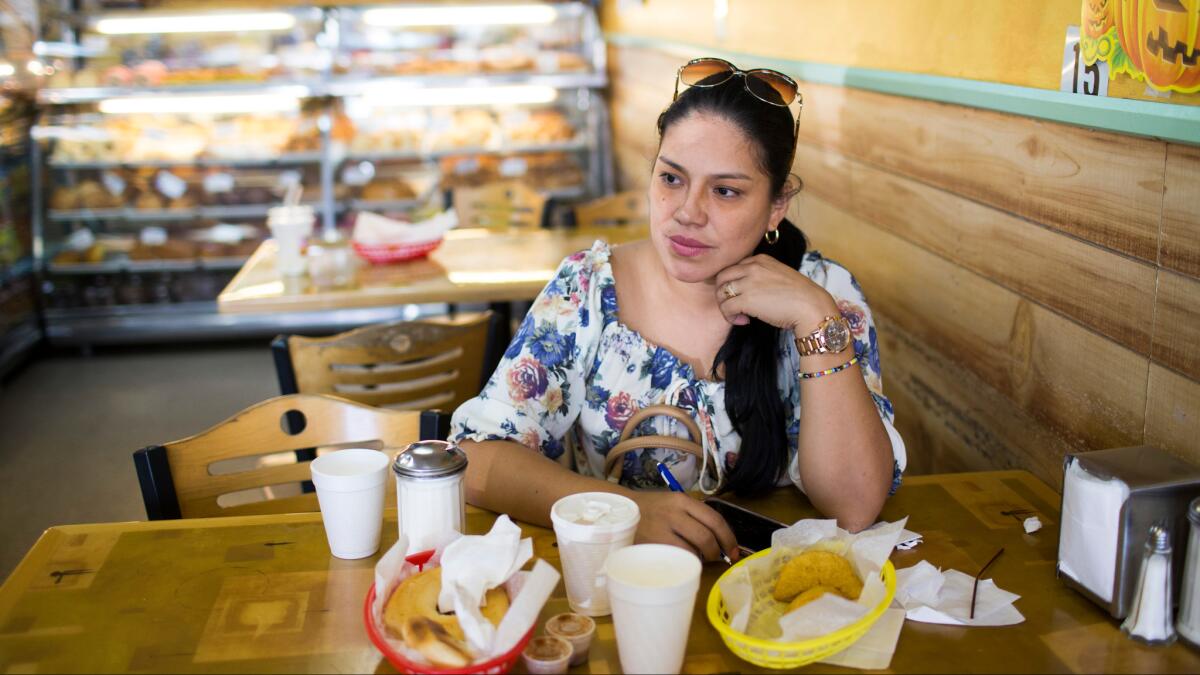 Martha Renza, 38, at Mi Colombia Bakery on Elmore Avenue in Elizabeth.
