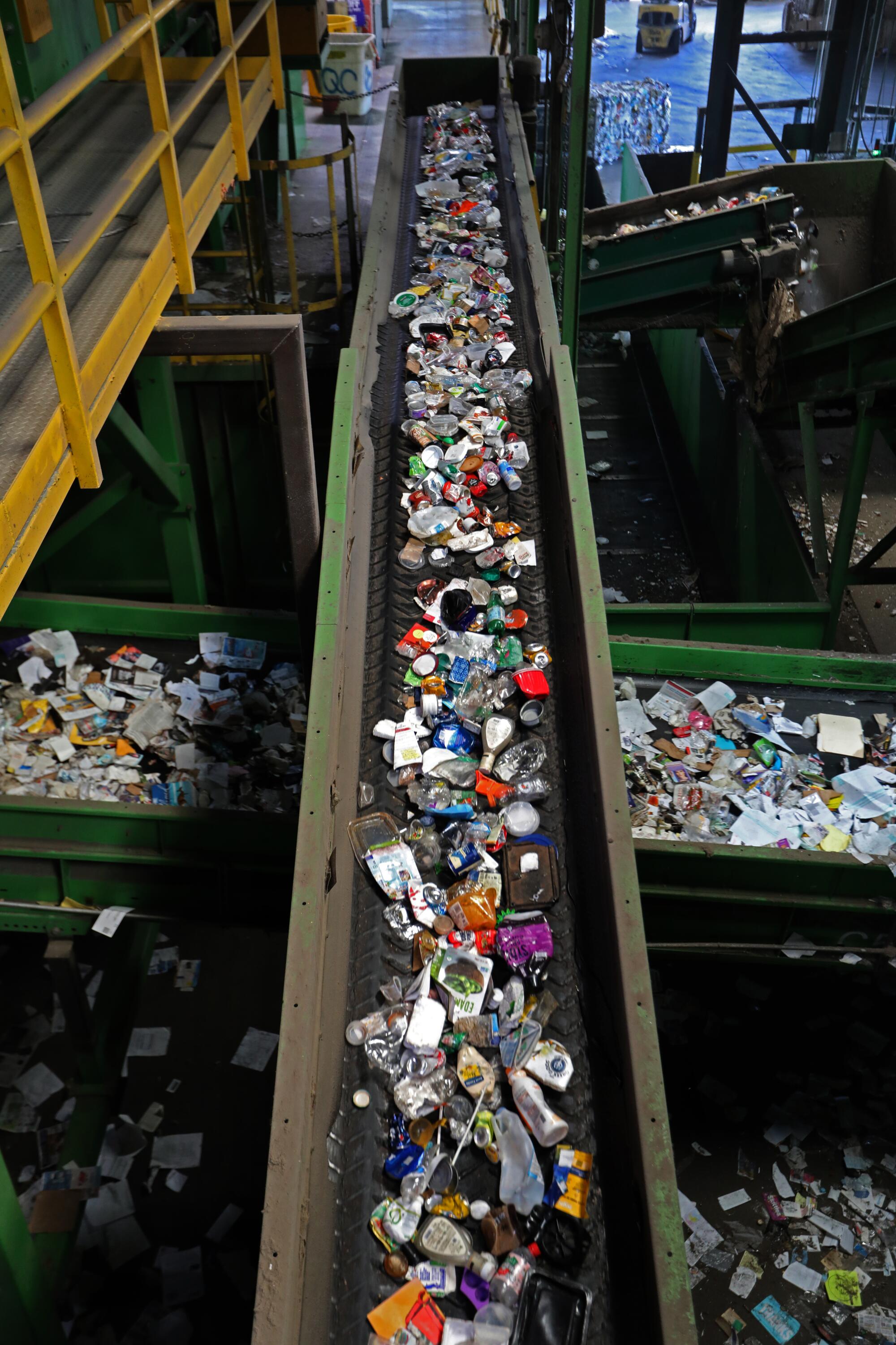 Recyclables move along conveyor belts at Potential Industries