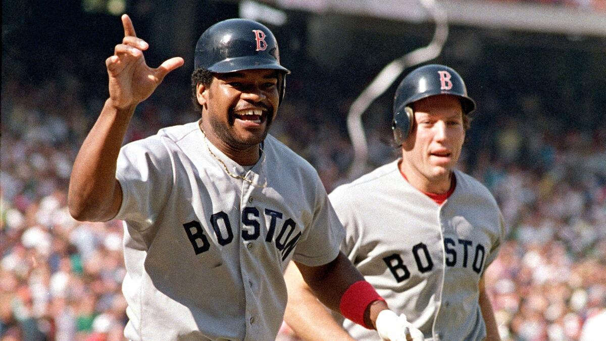 Dave Henderson celebrates after hitting a two-out, two-strike, go-ahead home run in the ninth inning against the Angels in Game 5 of the 1986 American League Championship Series.