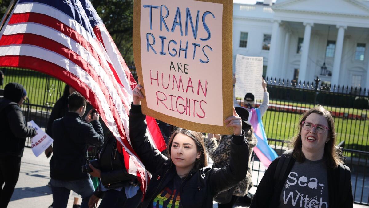Activists rally in front of the White House on Oct. 22.