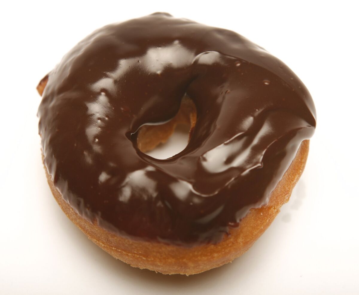 National Doughnut Day is Friday. Celebrate with a couple specials around town. Pictured is a buttermilk doughnut with chocolate frosting from the L.A. Times test kitchen.