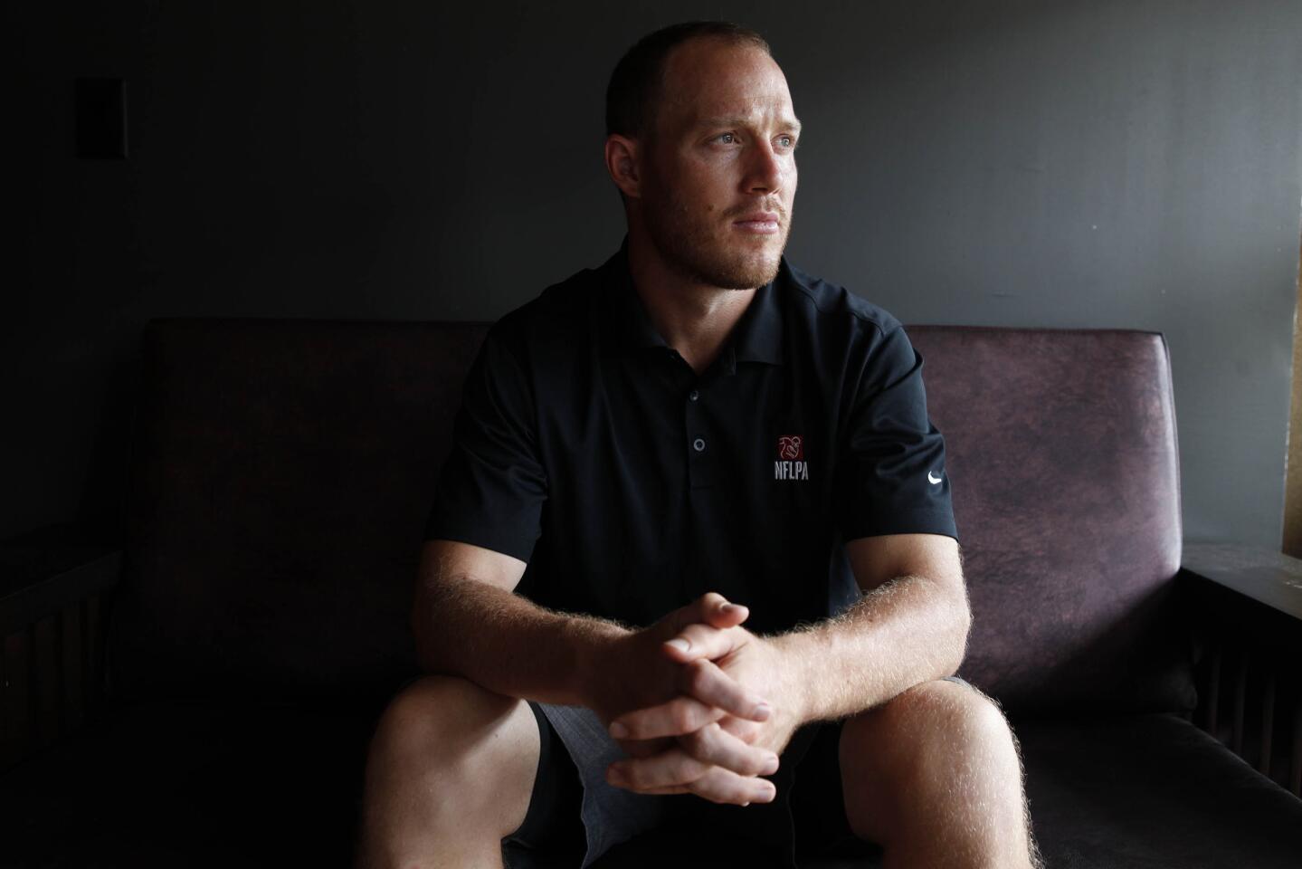 Tim Shaw sits in the dining room at Music City Pizza in Nashville.