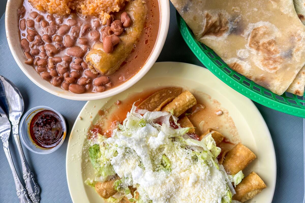 Chorizo con huevo and pork tacos at Las Cuatro Milpas in San Diego