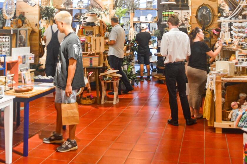 During the SeaHive La Jolla grand opening, guests shopped at different vendor booths.