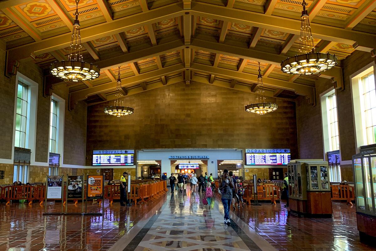 The main hall at Union Station has gleaming wood ceilings and tiled floors.