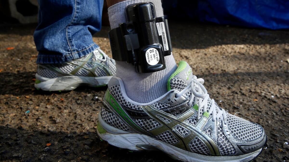 As part of the "catch and release" of immigrants, each man and woman is fit with a tracking ankle cuff to ensure they show up for their immigration hearings in coming months.