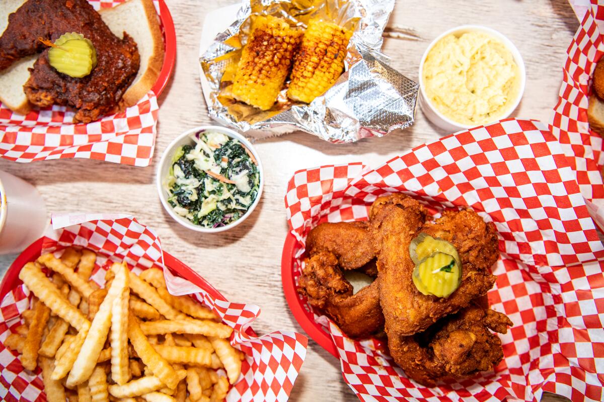 A spread of hot chicken and sides at Hotville. 