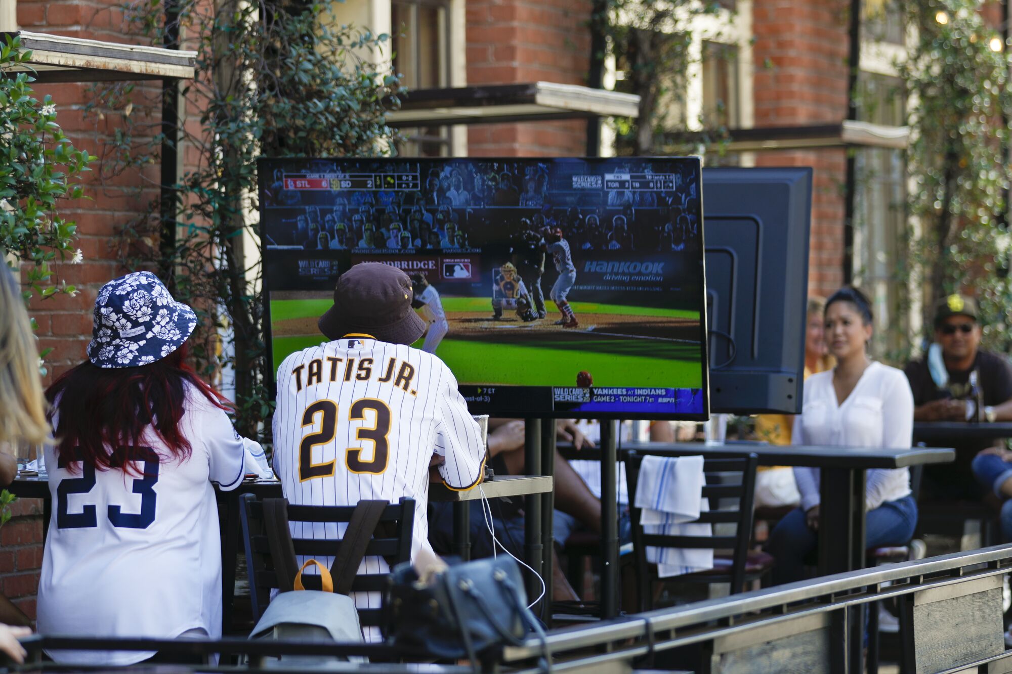 Fans watched a baseball game at Social Tap Eatery just outside Petco Park in 2020. 