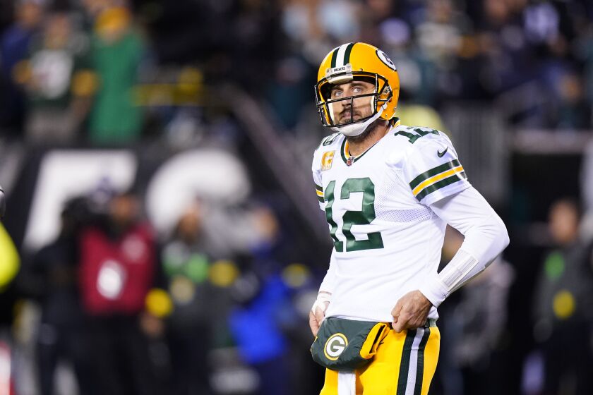 Green Bay Packers quarterback Aaron Rodgers looks are a replay during the first half of an NFL football game against the Philadelphia Eagle, Sunday, Nov. 27, 2022, in Philadelphia. (AP Photo/Chris Szagola)