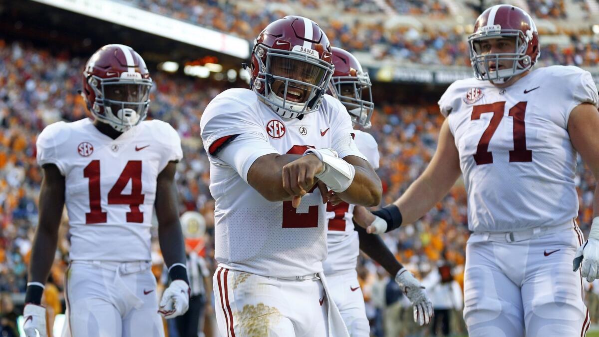 Alabama quarterback Jalen Hurts (2) celebrates after scoring a touchdown in the second half against Tennessee on Oct. 20, 2018, in Knoxville, Tenn. Alabama won 58-21.
