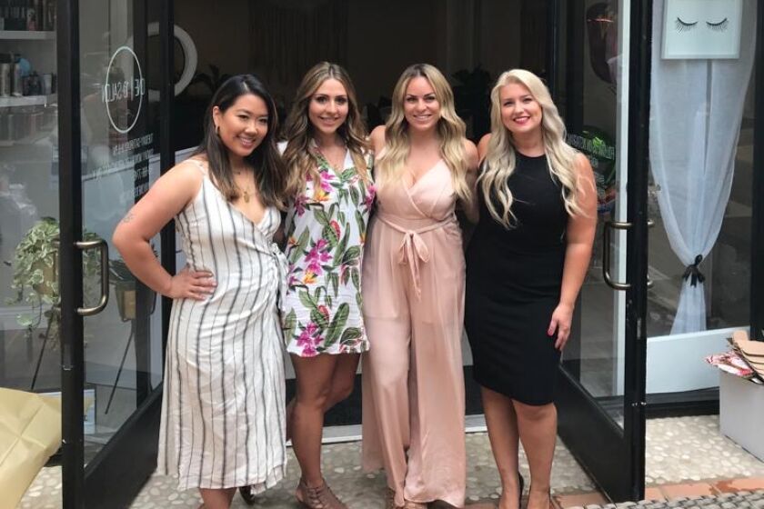 From left, Roselle Rabara, Melanie Menin, Andrea Mills and Jenna Brader, owners of One10 Salon on Girard Avenue. The salon is back open June 1 after the mandated coronivurs closures.