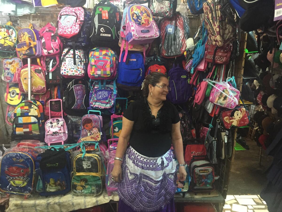 Victoria Espinal has worked in Nicaragua's vast Mercado Oriental for 26 years, selling backpacks and clothes. There are days when she doesn't make any money. "That's how it is," she said.