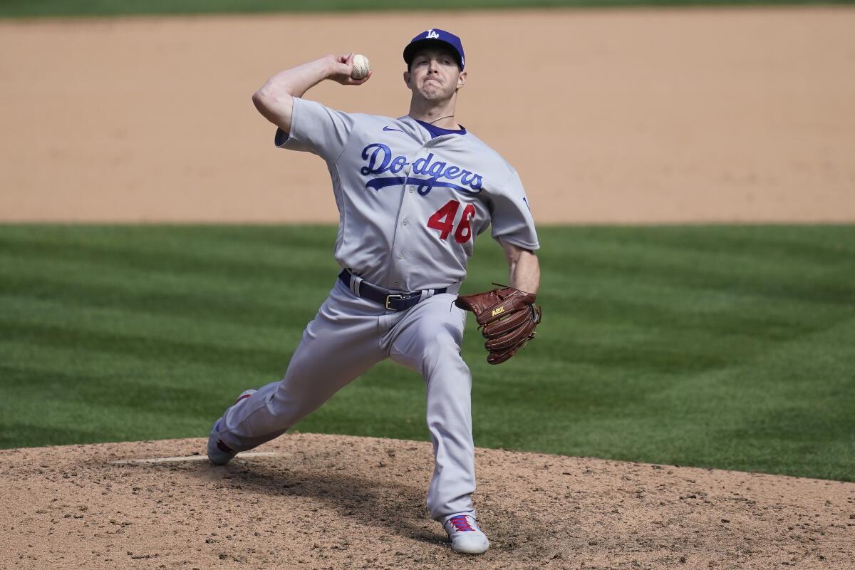 Los Angeles Dodgers' Corey Knebel against the Oakland Athletics during a baseball game in Oakland, Calif.