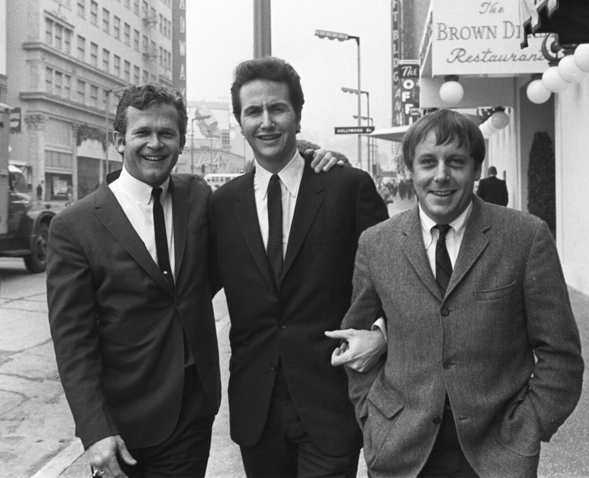 Kingston Trio members Bob Shane, left, John Stewart and Nick Reynolds in Hollywood in 1967.