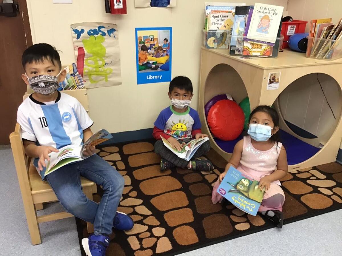 Even while following Covid restrictions at Solana Beach Head Start, students are enjoying their new books.