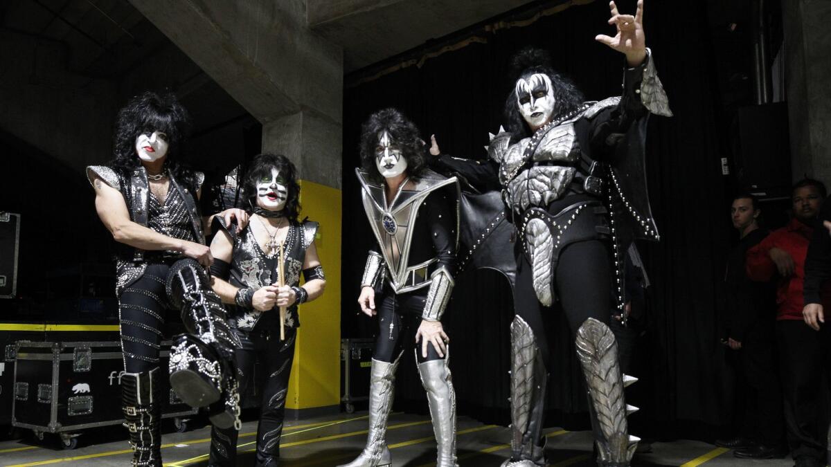 KISS band members, from left, Paul Stanley, Eric Singer, Tommy Thayer and Gene Simmons, before a show in San Diego.