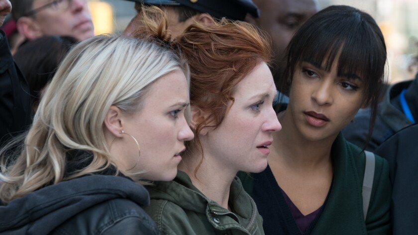 Emily Osment, left, Brittany Snow and Megalyn Echikunwoke in "Almost Family" on Fox.