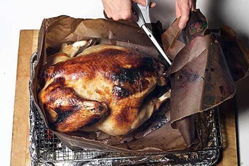 GLISTENING: Apricot preserves glaze this turkey, which is cooked in a bag with Passover vegetable stuffing.