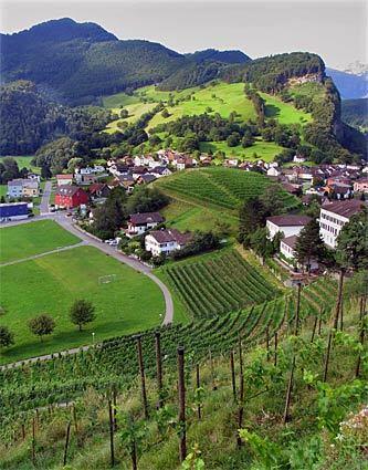 Liechtenstein Vineyards and a pretty hamlet lie on the outskirts of Gutenberg Castle near the town of Balzers in Liechtenstein, a small German-speaking principality that's tucked into the Alps between Switzerland and Austria.