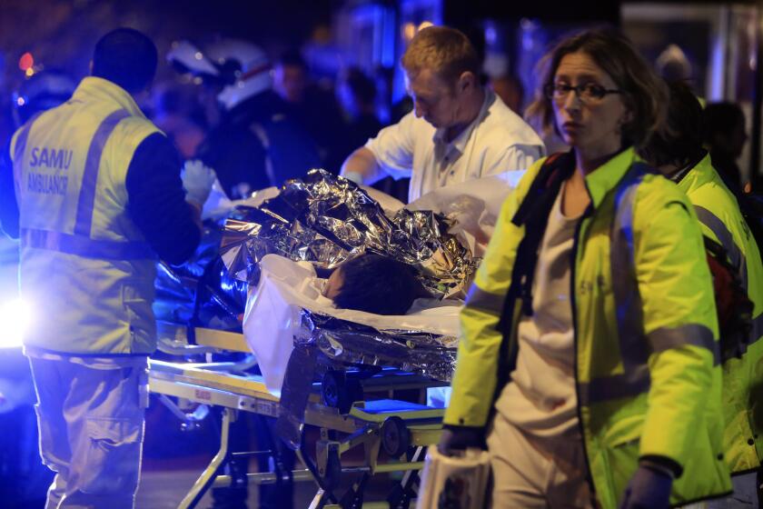 A victim of the Nov. 13 attack on the Bataclan theater in Paris is readied for transport Medical professionals recount the night's events in the journal the Lancet.