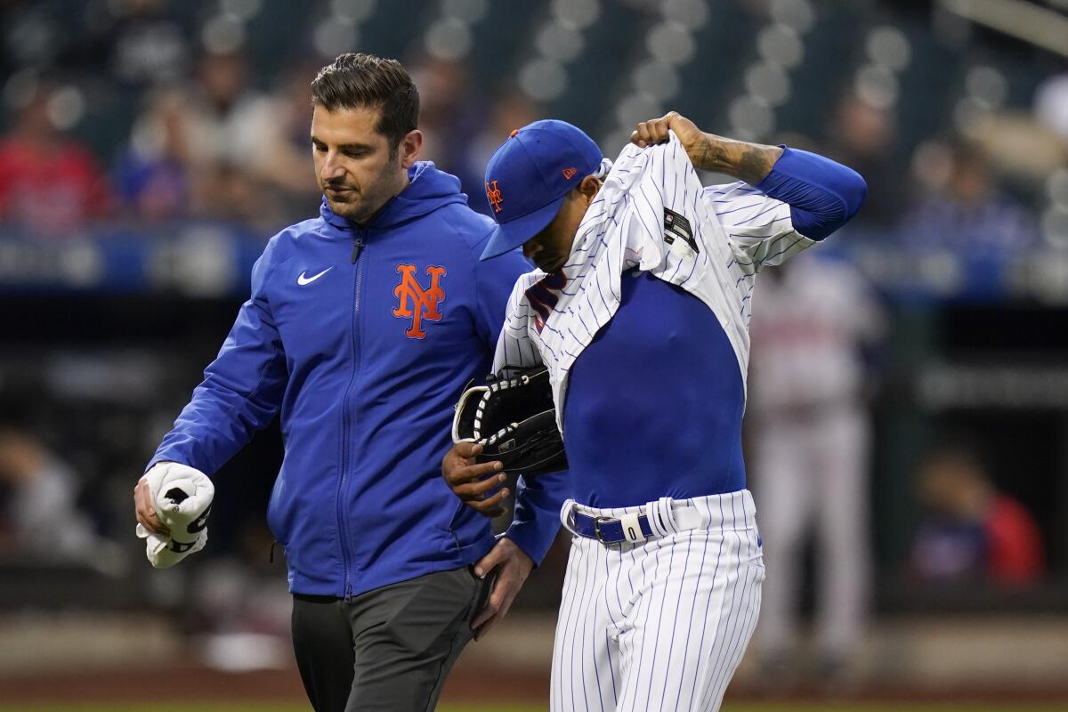 April 06, 2023: Atlanta Braves players gather around infielder