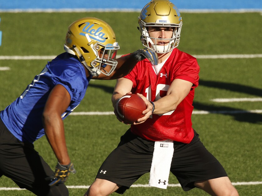 Matt Lynch (15) came to UCLA as a quarterback before moving to tight end last season.