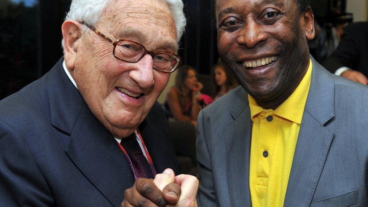 Former U.S. Secretary of State Henry Kissinger and Edson Arantes do Nascimento 'Pele' appear at the Closing Ceremony of the London Olympic Games on August 12, 2012.