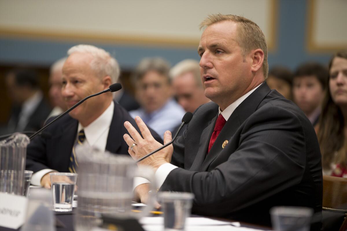 Rep. Jeff Denham (R-Turlock) right, testifies on Capitol Hill in July. He has announced his support for a broad immigration overhaul bill.