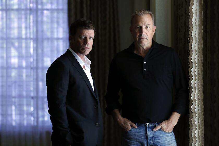 BEVERLY HILLS-CA-JUNE 11, 2018: Filmmaker Taylor Sheridan, left, and actor Kevin Costner, who stars in Sheridan's new series for the Paramount Network "Yellowstone," are photographed in Beverly Hills on Monday, June 11, 2018. (Christina House / Los Angeles Times)
