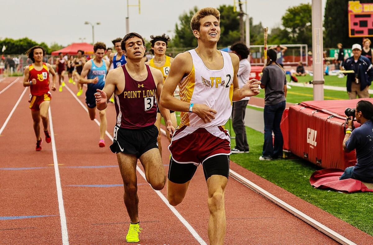 Senior Ryan Thomas winning the CIF 1,600 run.