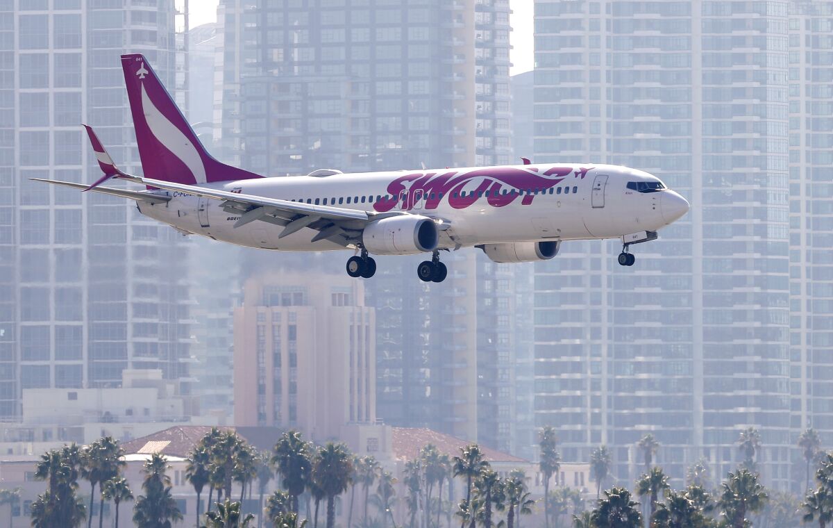A Swoop airlines 737 jet arrives at San Diego International Airport on its inaugural direct flight from Edmonton on Sunday.