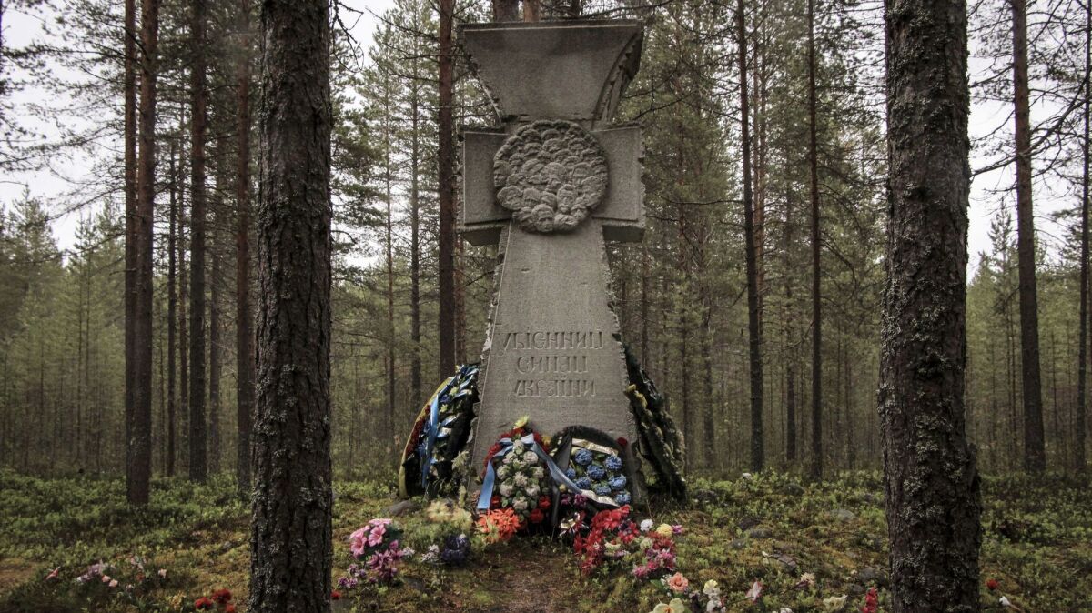A monument memorializes Ukrainians who were executed at Sandarmokh in Karelia.