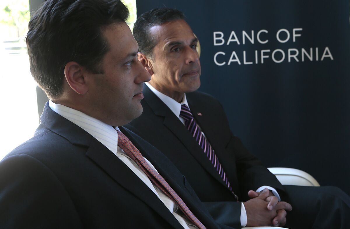 Former Los Angeles Mayor Antonio Villaraigosa, right, with Steven Sugarman, the former chairman of Banc of California, one of Villaraigosa's clients since leaving office.
