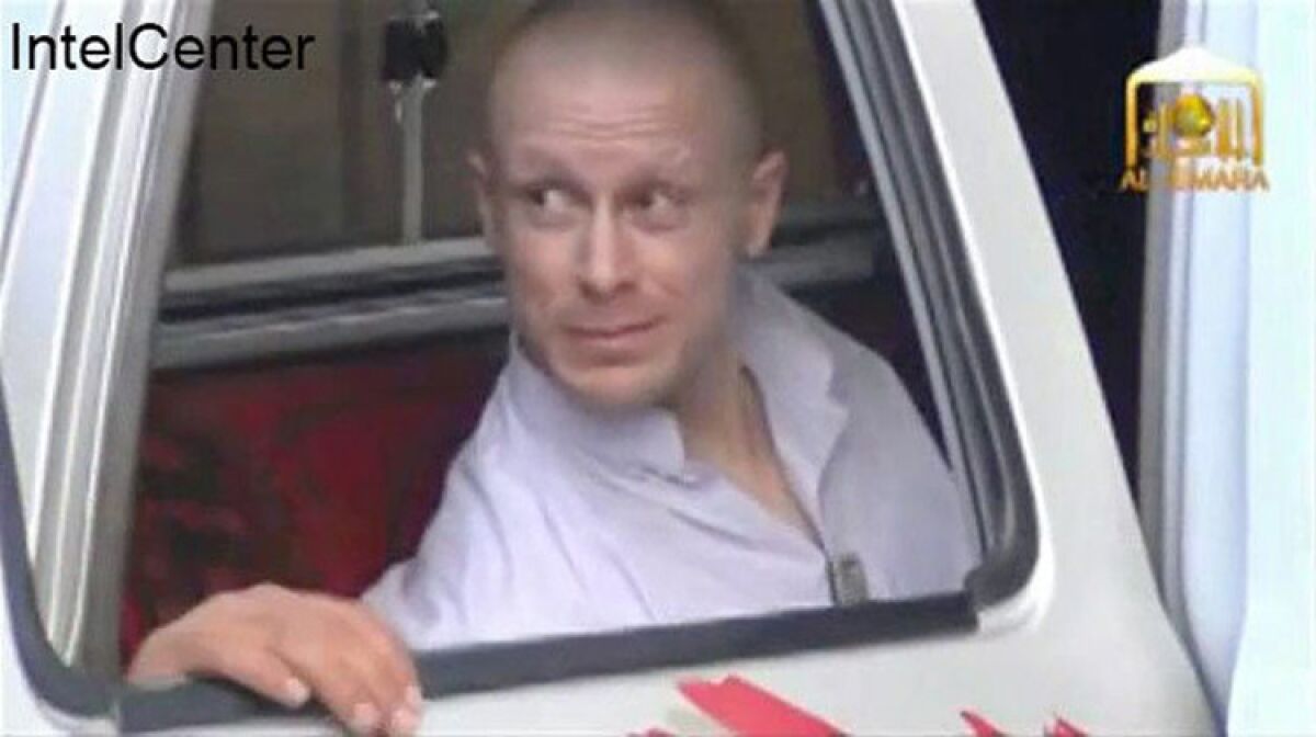 Captured US Army soldier Bowe Bergdahl during his release by Taliban fighters at an undisclosed location in Afghanistan. Bergdahl was released on May 31 in a swap for five senior Taliban members held in Guantanamo Bay prison.