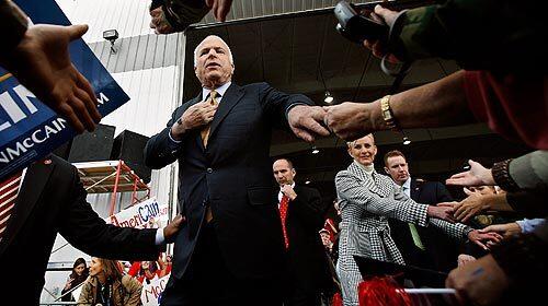 Sen. John McCain and his wife Cindy greets supporters during his last campaign rally on Tuesday in Grand Junction, Colo.