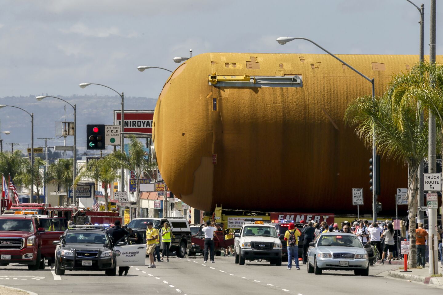 ET-94, NASA's last remaining space shuttle external tank, enters La Brea Avenue from Arbor Vitae Street in Inglewood on its way to the California Science Center on Saturday.