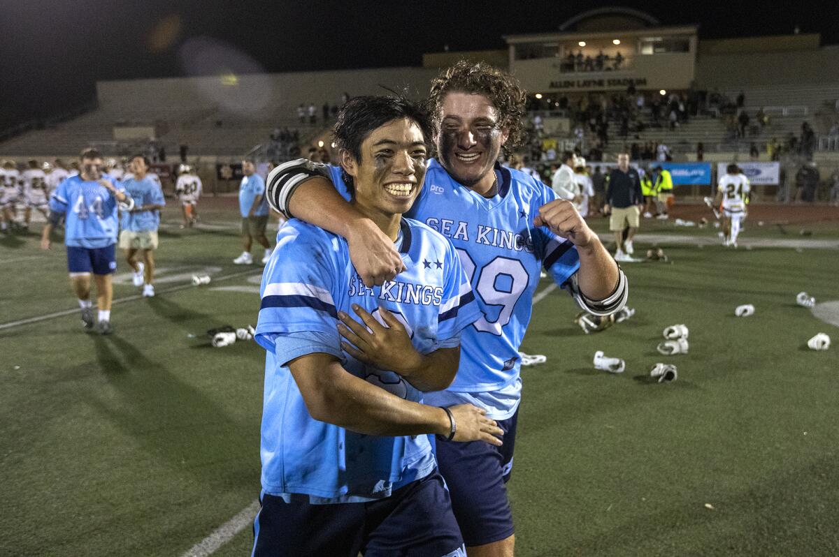 Corona del Mar's Logan Ip, left, and Nicolas Peloso celebrate after the Sea Kings beat Foothill in the CIF Division 1 final.