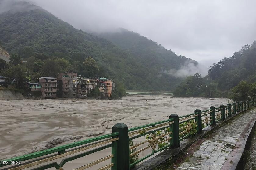 Water levels of the Teesta river rises in Sikkim, India, Wednesday, Oct. 4, 2023. Twenty-three Indian army soldiers are missing after a cloudburst triggered flash floods in the northeastern state of Sikkim. The flooding occurred along the Teesta River in Lachen valley, a statement from India's army said Wednesday, adding that search efforts were underway. (Indian Army via AP)