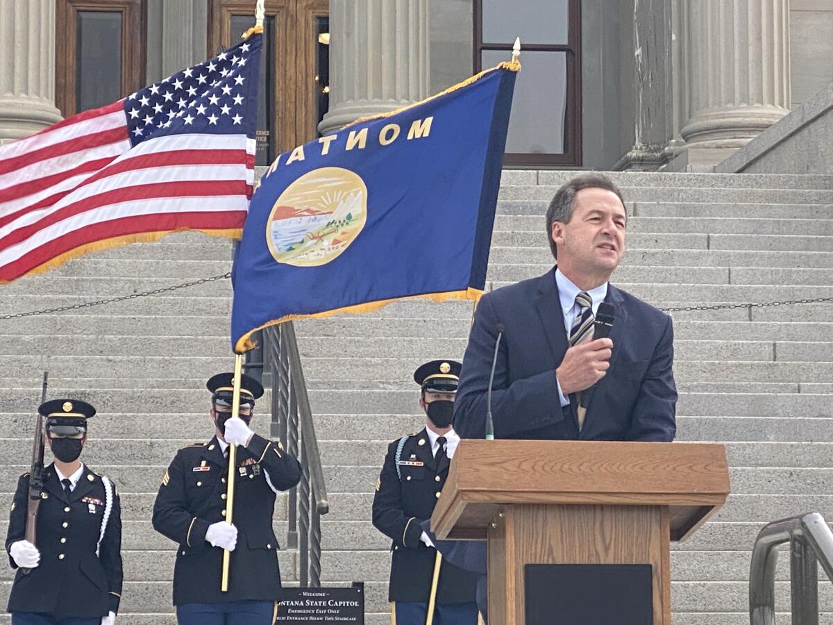 Montana Gov. Steve Bullock speaks in front of the state capitol on Oct. 14.