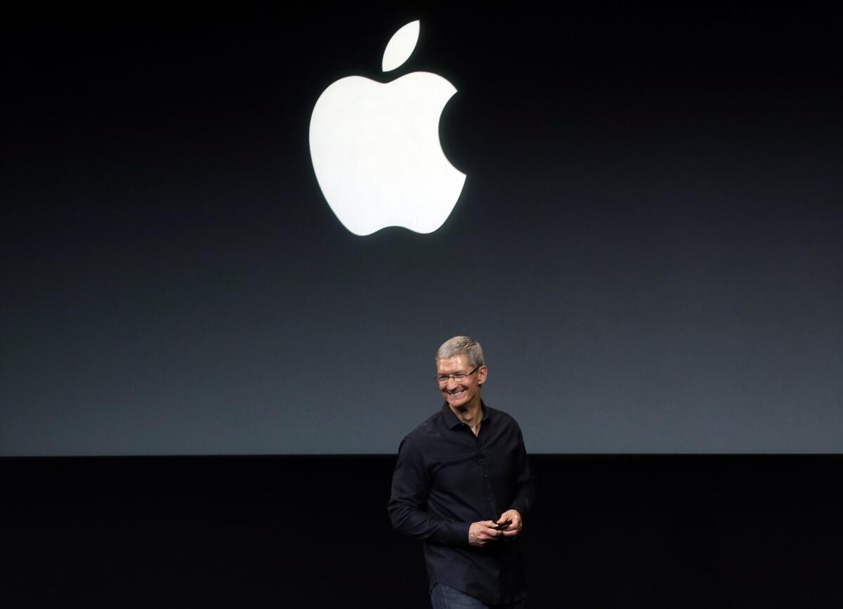 Apple Chief Executive Tim Cook speaks before a new-product introduction in Cupertino, Calif.