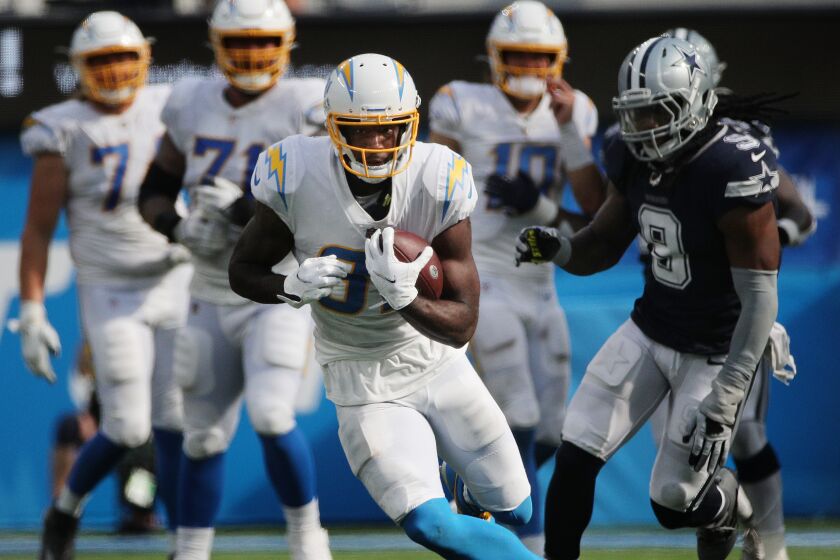 INGLEWOOD, CA - SEPTEMBER 19, 2021: Los Angeles Chargers wide receiver Mike Williams (81) finds an open field.