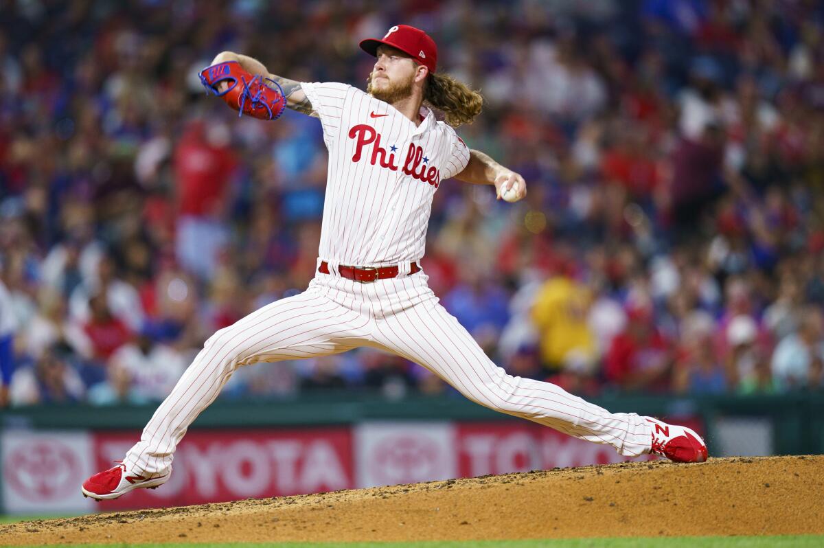 Philadelphia Phillies starting pitcher Bailey Falter throws during fourth inning of the second baseball game of a doubleheader against the New York Mets, Saturday, Aug. 20, 2022, in Philadelphia. (AP Photo/Chris Szagola)