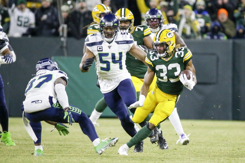 Green Bay Packers Hold Off Seattle Seahawks To Reach Nfc Championship Game Los Angeles Times