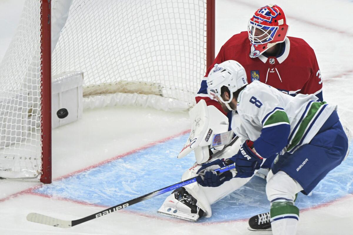 Canucks rebound from loss to beat Canadiens 5-2, improve to 11-3-1 - The  San Diego Union-Tribune