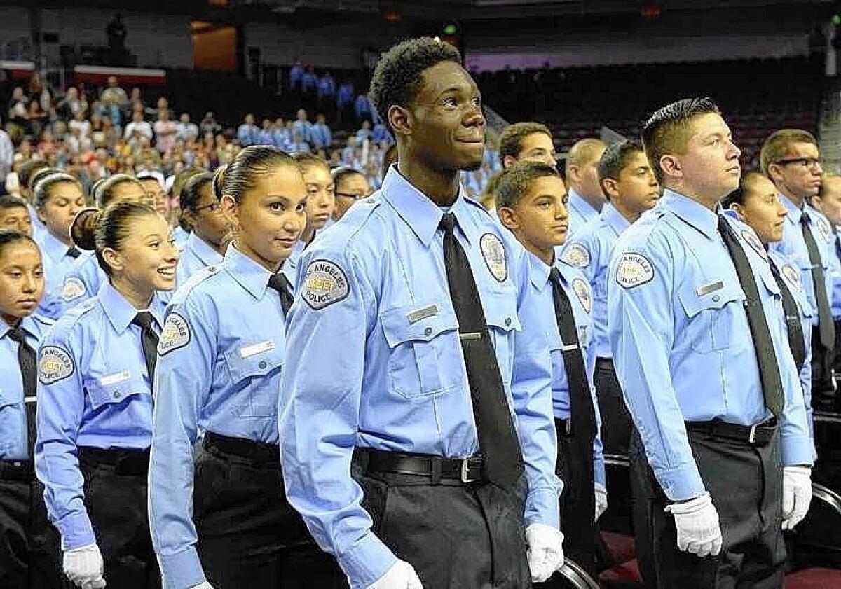The largest-ever LAPD cadet graduating class, 652 people ages 14 to 20, filled the Galen Center at USC with family and supporters.