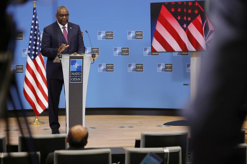 U.S. Secretary for Defense Lloyd J. Austin III speaks during a media conference at NATO headquarters