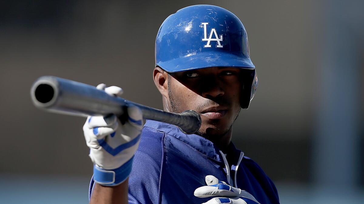 Dodgers center fielder Yasiel Puig prepares to take part in batting practice before Monday's game against the Angels.